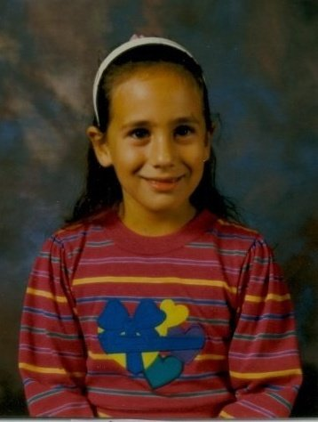 Illustration for article titled Goofy Glasses, Pretty Pigtails & Snaggletooth Smiles: September Is For School Portraits